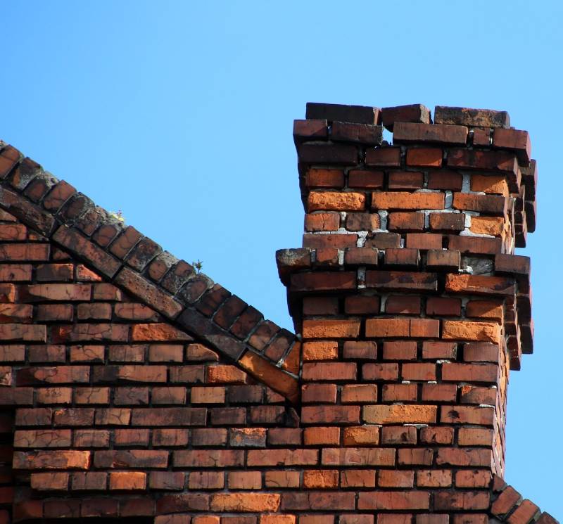 Damaged chimney on an Rosemead home showing cracks and missing mortar